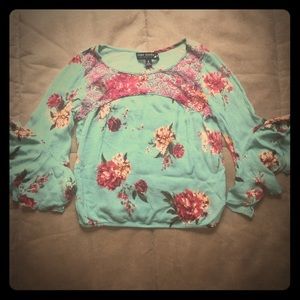 Slightly cropped floral shirt
